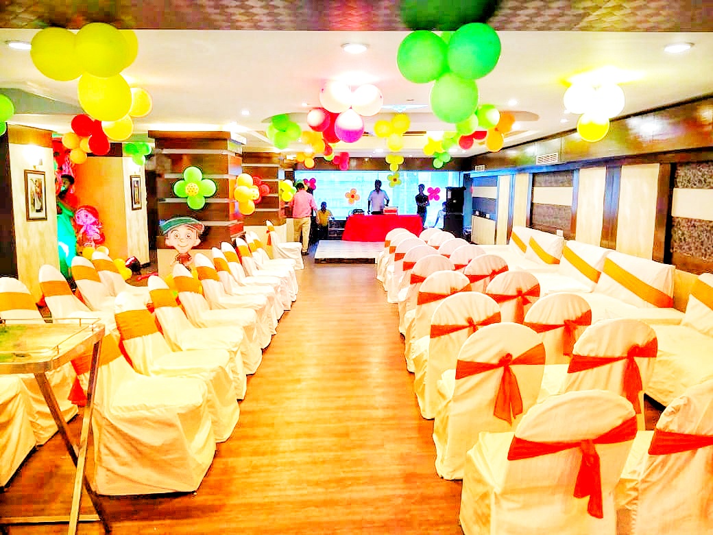 Mangalam Banquet Main hall with Seating arrangements and Balloon Decoration